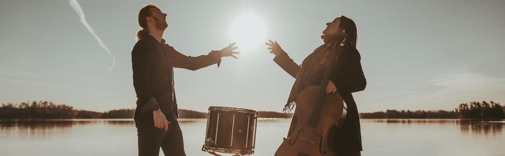 Magdalena Sas and Dr. Ryan Loken with sunset behind